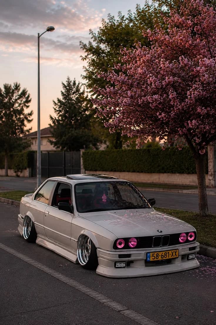 Phone photo of a white classic BMW