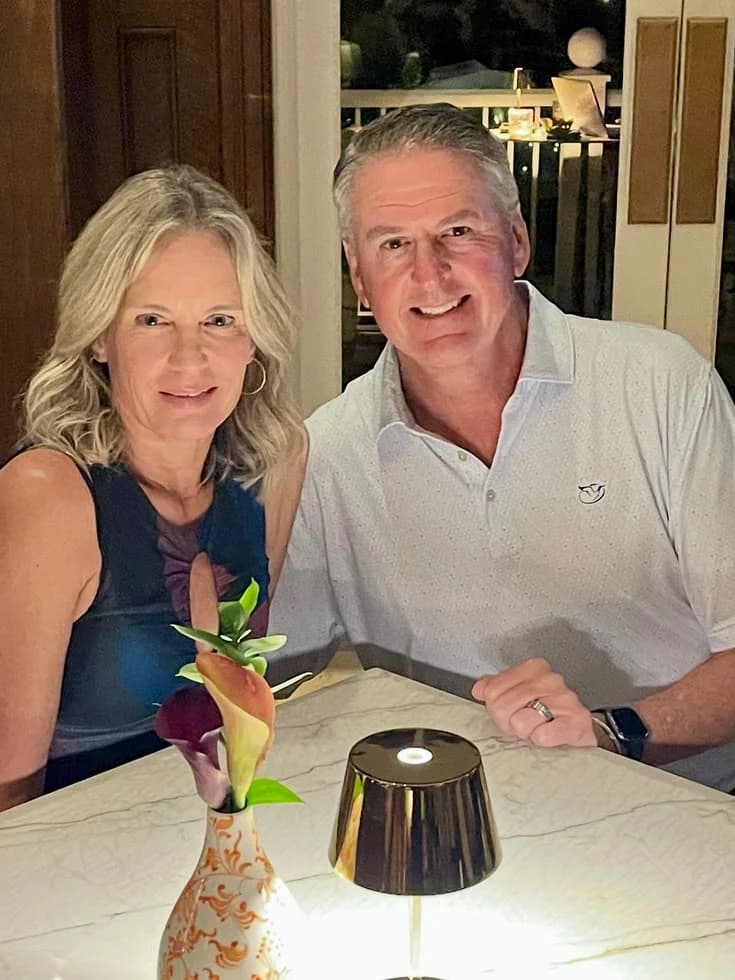 Casual dinner photo of a smiling couple