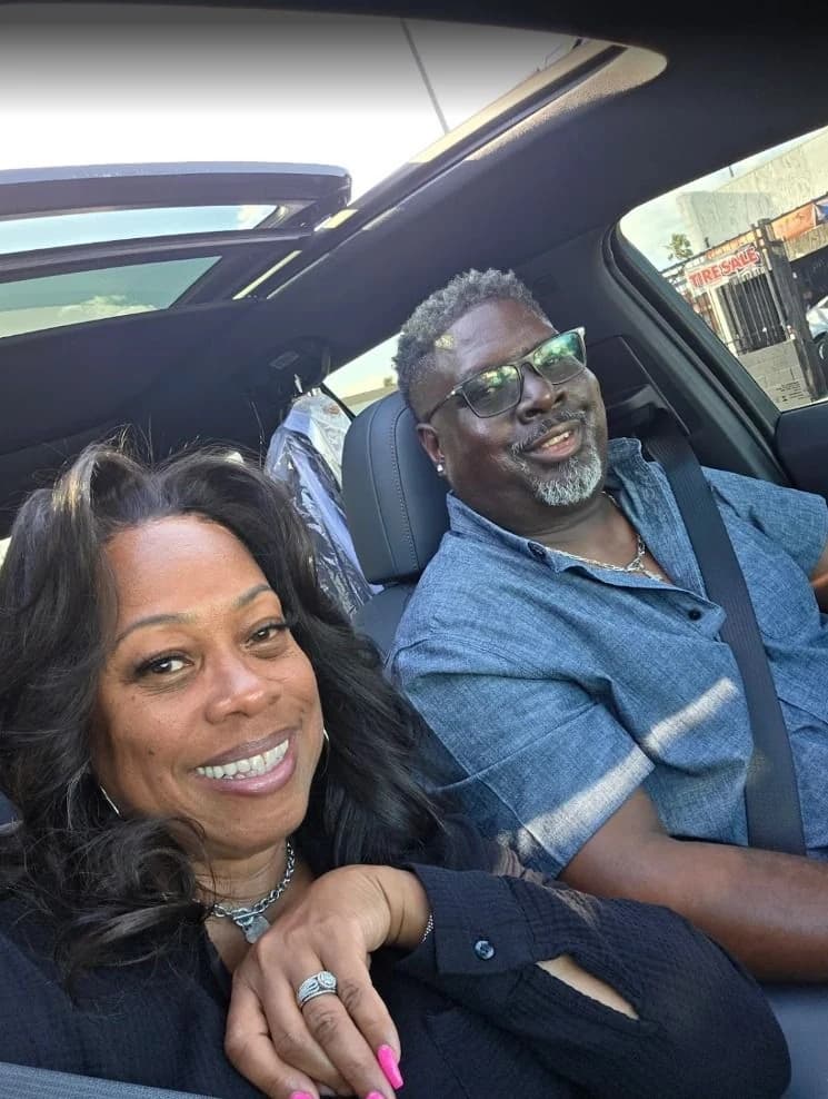 Casual car selfie of a smiling couple